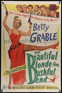 7b084 BEAUTIFUL BLONDE FROM BASHFUL BEND 1sh '49 Preston Sturges, Betty Grable has the big guns!