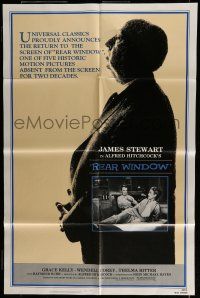 7h659 REAR WINDOW 1sh R83 Alfred Hitchcock, image of voyeur Jimmy Stewart & sexy Grace Kelly!