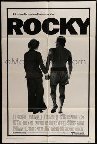 7h671 ROCKY 1sh '76 boxer Sylvester Stallone holding hands with Talia Shire, boxing classic!