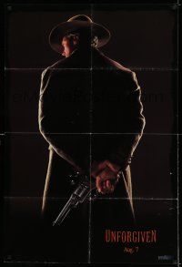 7h931 UNFORGIVEN dated teaser DS 1sh '92 classic image of gunslinger Clint Eastwood w/back turned!