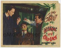7j070 ARSENIC & OLD LACE LC '44 Peter Lorre & Raymond Massey toast over bound & gagged Cary Grant!