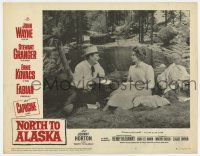 7j542 NORTH TO ALASKA LC #5 R64 close up of John Wayne having a picnic with pretty Capucine!
