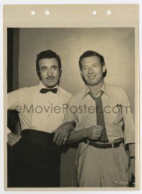 7m376 FRENCH LINE candid 8x11 key book still '54 Gilbert Roland poses with wardrobe designer!