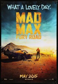 7r458 MAD MAX: FURY ROAD teaser DS 1sh '15 Tom Hardy in the title role next to his V8 Interceptor!
