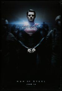7r467 MAN OF STEEL teaser DS 1sh '13 Henry Cavill in the title role as Superman handcuffed!