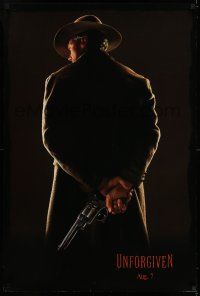 7r793 UNFORGIVEN dated teaser DS 1sh '92 classic image of gunslinger Clint Eastwood w/back turned!