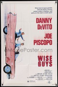 8f975 WISE GUYS 1sh '86 wacky image of Danny DeVito & Joe Piscopo in pink Cadillac!