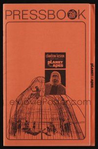8m635 PLANET OF THE APES pressbook '68 Charlton Heston, classic sci-fi, cool image of caged humans!