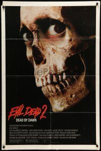 8p272 EVIL DEAD 2 1sh '87 Dead By Dawn, directed by Sam Raimi, huge close up of creepy skull!
