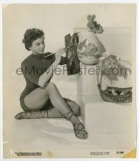 8s079 AMERICAN IN PARIS candid 8x9.25 still '51 Leslie Caron painting a huge egg for Easter!