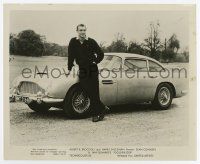 8s304 GOLDFINGER 8.25x10 still '64 great image of Sean Connery as James Bond by his Aston Martin!