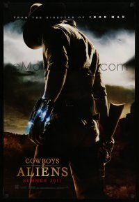 8w163 COWBOYS & ALIENS Summer teaser DS 1sh '11 cool image of Daniel Craig w/ alien weapon!