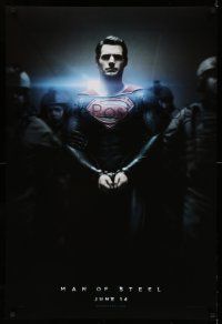 8w523 MAN OF STEEL teaser DS 1sh '13 Henry Cavill in the title role as Superman handcuffed!