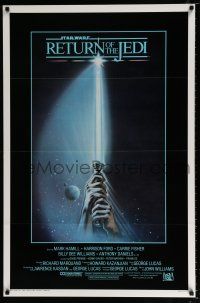 8w651 RETURN OF THE JEDI int'l 1sh '83 George Lucas, art of hands holding lightsaber by Tim Reamer!