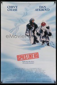 8w721 SPIES LIKE US 1sh '85 Chevy Chase, Dan Aykroyd, directed by John Landis!