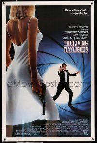 9c424 LIVING DAYLIGHTS 1sh '87 Dalton as Bond & sexy Maryam d'Abo in sheer dress w/gun!