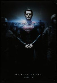 9c451 MAN OF STEEL teaser DS 1sh '13 Henry Cavill in the title role as Superman handcuffed!