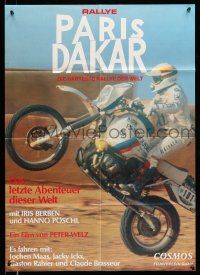 9g565 RALLYE PARIS DAKAR German '84 cool image of motorcyclist riding a wheelie!