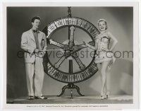 9h100 ARE YOU WITH IT 8x10.25 still 48 Donald O'Connor & Olga San Juan with wheel of fortune!
