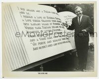 9h585 LOVED ONE 8x10.25 still '65 great image of Jonathan Winters reading giant book!