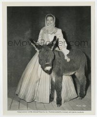 9h845 SONG OF SCHEHERAZADE candid 8.25x10 still '46 Yvonne De Carlo posing with baby burro!