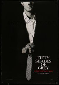 9k254 FIFTY SHADES OF GREY teaser DS 1sh '15 Jamie Dornan in the title role holding tie!