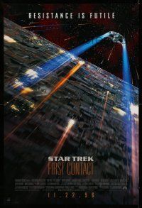 9k708 STAR TREK: FIRST CONTACT int'l advance DS 1sh '96 image of starship Enterprise above Borg cube