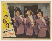 9r746 HOW'S ABOUT IT LC '43 close up of the Andrews Sisters pointing their thumbs like hitchhikers!
