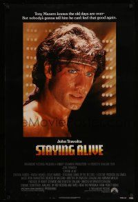 9w725 STAYING ALIVE 1sh '83 super close up of John Travolta in Saturday Night Fever sequel!