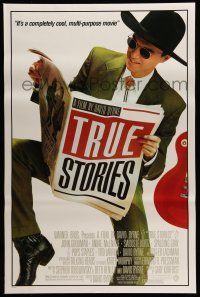 9w781 TRUE STORIES 1sh '86 giant image of star & director David Byrne reading newspaper!