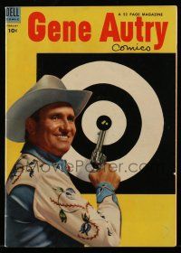 1a381 GENE AUTRY COMICS comic book February 1954 c/u of Gene with pistol drawn by practice target!