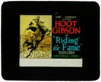 1a099 RIDING FOR FAME glass slide '28 wonderful art of cowboy Hoot Gibson on his rearing horse!