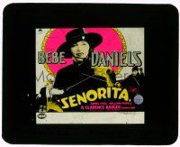 1a105 SENORITA glass slide '27 great image of pretty Bebe Daniels in Zorro-like disguise!