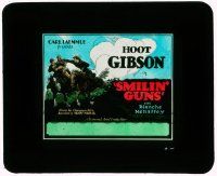 1a108 SMILIN' GUNS glass slide '29 great image of cowboy hero Hoot Gibson on horse rescuing woman!