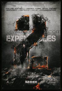 1c238 EXPENDABLES 2 teaser DS 1sh '12 image of tough-guy Sylvester Stallone in blown-up wall!