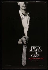 1c246 FIFTY SHADES OF GREY teaser DS 1sh '15 Jamie Dornan in the title role holding tie!