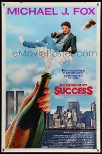 1c687 SECRET OF MY SUCCESS 1sh '87 wacky image of Michael J. Fox & huge bottle of champagne!