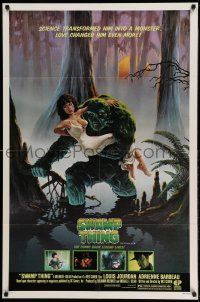 1f828 SWAMP THING 1sh '82 Wes Craven, cool Richard Hescox art of him holding Adrienne Barbeau!