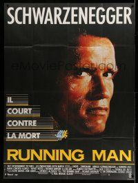 1g807 RUNNING MAN French 1p '88 super close up of Arnold Schwarzenegger, he runs against death!