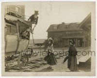 1m698 OUR HOSPITALITY 8x10.25 still '23 man on railroad car coach lowers his horn to Buster Keaton!