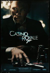 1w146 CASINO ROYALE teaser DS 1sh '06 Craig as Bond at poker table with gun!