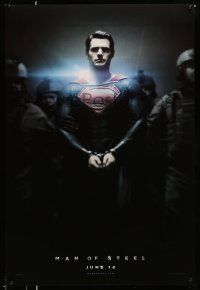 1w513 MAN OF STEEL teaser DS 1sh '13 Henry Cavill in the title role as Superman handcuffed!