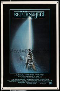 1w653 RETURN OF THE JEDI int'l 1sh '83 George Lucas, art of hands holding lightsaber by Tim Reamer!