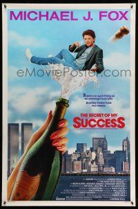 1w686 SECRET OF MY SUCCESS 1sh '87 wacky image of Michael J. Fox & huge bottle of champagne!