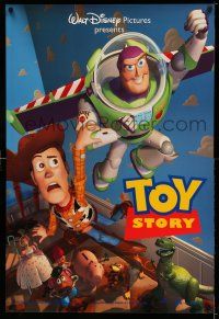 1w787 TOY STORY DS 1sh '95 Disney/Pixar cartoon, Buzz Lightyear flying over Woody, Bo Peep, more