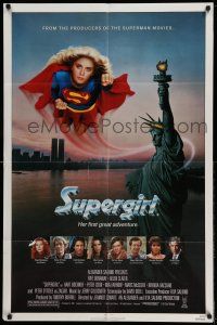 1y822 SUPERGIRL 1sh '84 super Helen Slater in costume flying over Statue of Liberty!