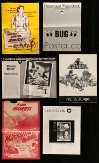 2a077 LOT OF 26 MOSTLY FOLDED UNCUT PRESSBOOKS '50s-70s advertising from a variety of movies!