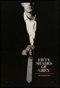 2c273 FIFTY SHADES OF GREY teaser DS 1sh '15 Jamie Dornan in the title role holding tie!