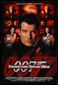 2c778 TOMORROW NEVER DIES 1sh '97 close-up of Pierce Brosnan as James Bond 007!
