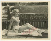 2d0470 BETTY GRABLE signed deluxe 8x10 still '50s smiling & showing her million dollar legs!